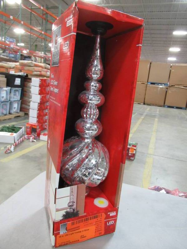 lot 22 image: Home Accents Holiday 16 in. LED Light Treetop in Silver, Model C-17289 B.