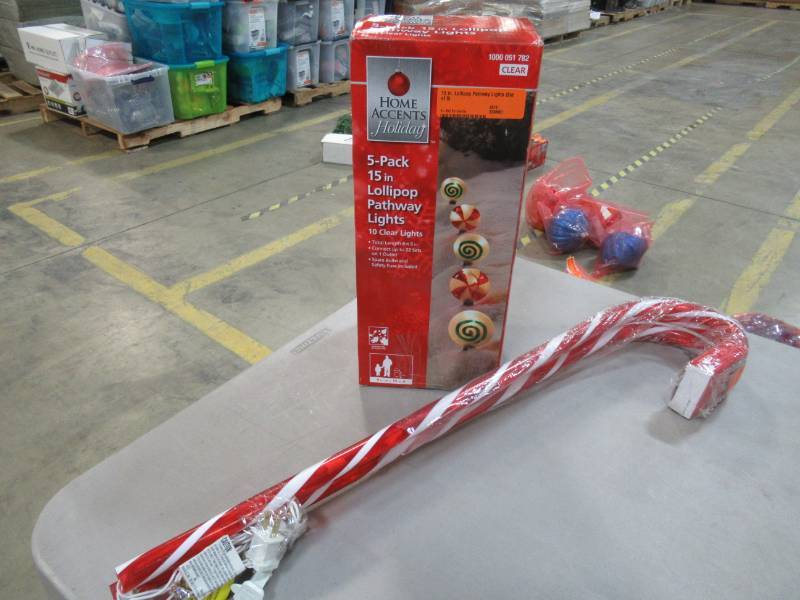 lot 52 image: Box of Home Accents Holiday 15 in. Lollipop Pathway Lights (Set of 5Box) & 27 Candy Canes (Set of 3)