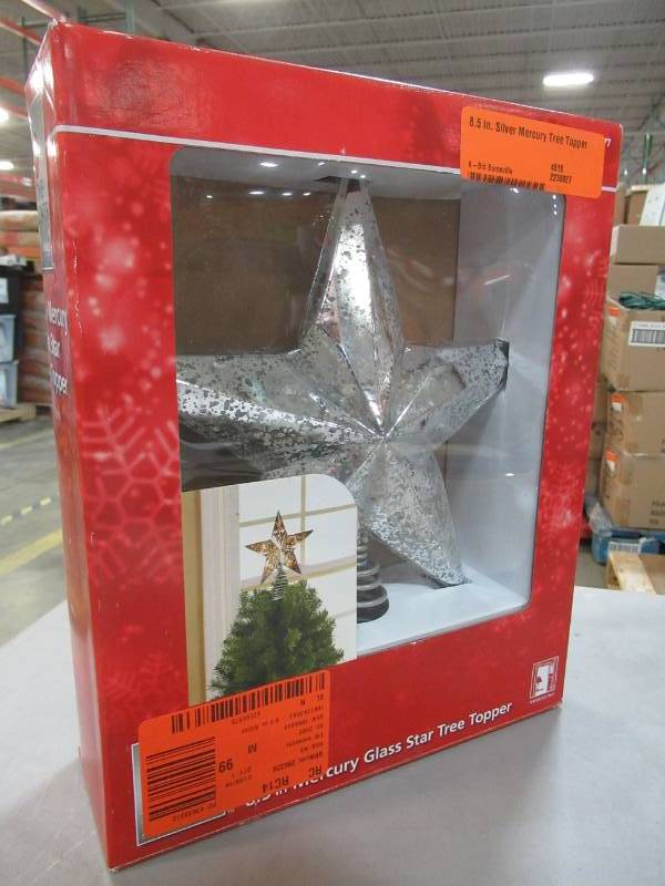 lot 75 image: Home Accents Holiday 8.5 in. Silver Mercury Tree Topper, Model 49057-56