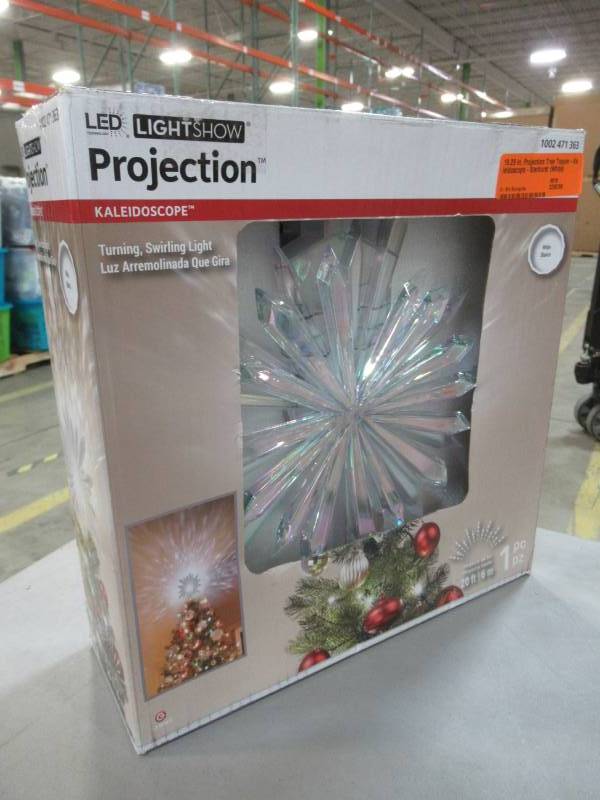 lot 69 image: LightShow 19.29 in. Projection Tree Topper-Kaleidoscope-Starburst (White), Model 39765