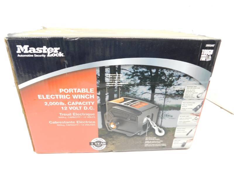 lot 35 image: Master Lock Portable Electric Winch   2953AT