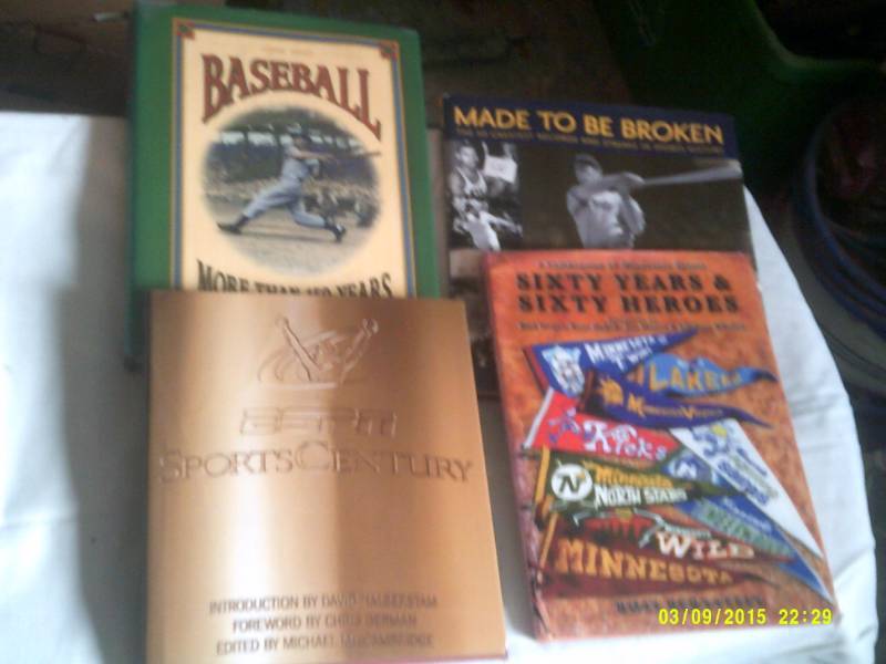 4 HARD COVER SPORTS BOOKS