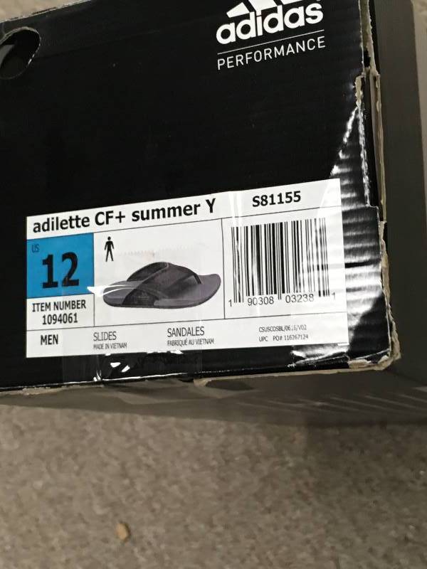 lot 27 image: Adidas Mens Adilette Flip Flops Size 12 not used