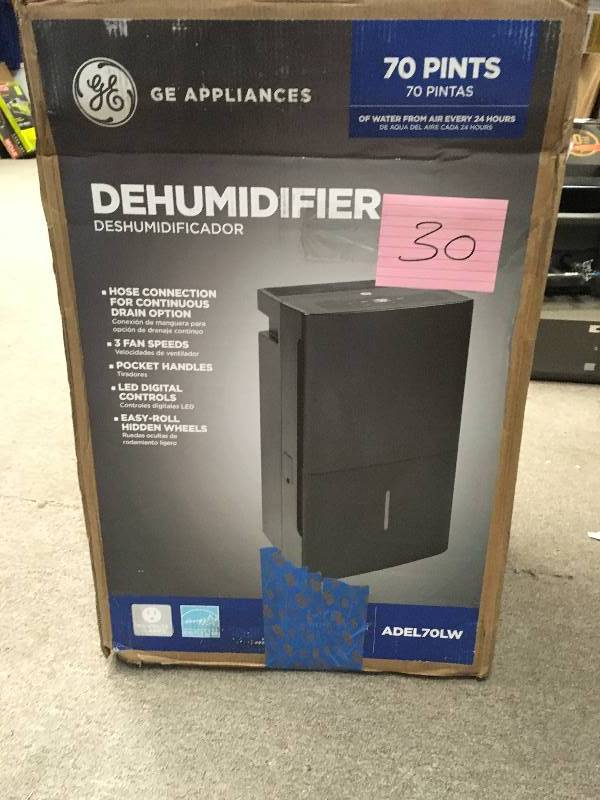 lot 30 image: GE 70-Pint 3-Speed Dehumidifier with Built-In Pump  in good working condition