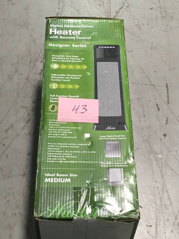 lot 43 image: Hunter 24 in. 1500-Watt Digital Ceramic Tower Heater with Remote Control