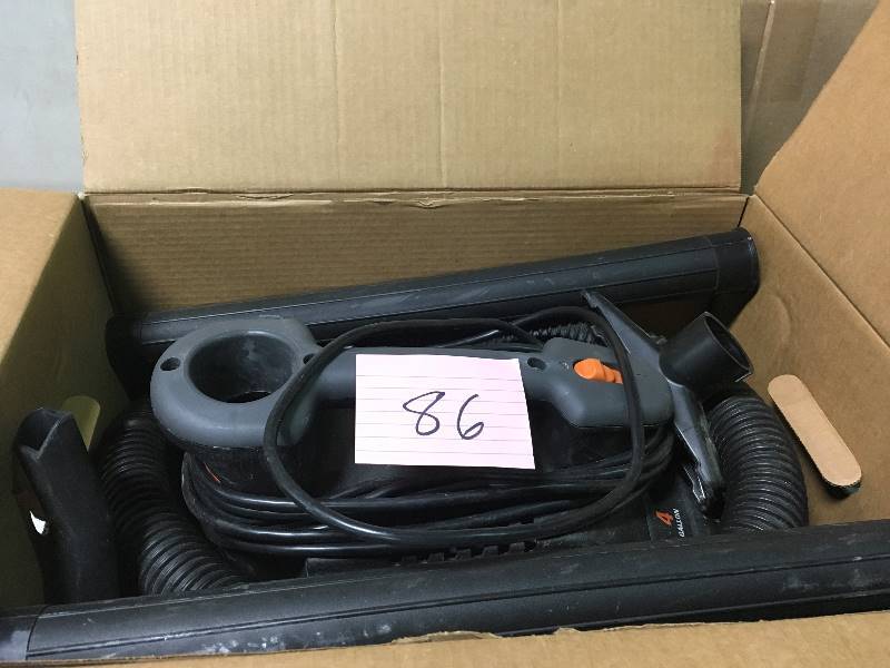 lot 86 image: Ridgid 4 Gal. 5.0-Peak HP Portable WetDry Vacuum Used in good working cond.