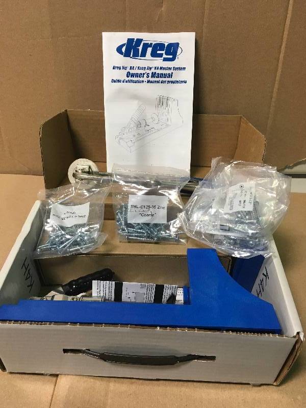 lot 26 image: Kreg Pocket-Hole System with 2 in. Face Clamp, 100 Screws, and Mini Jig