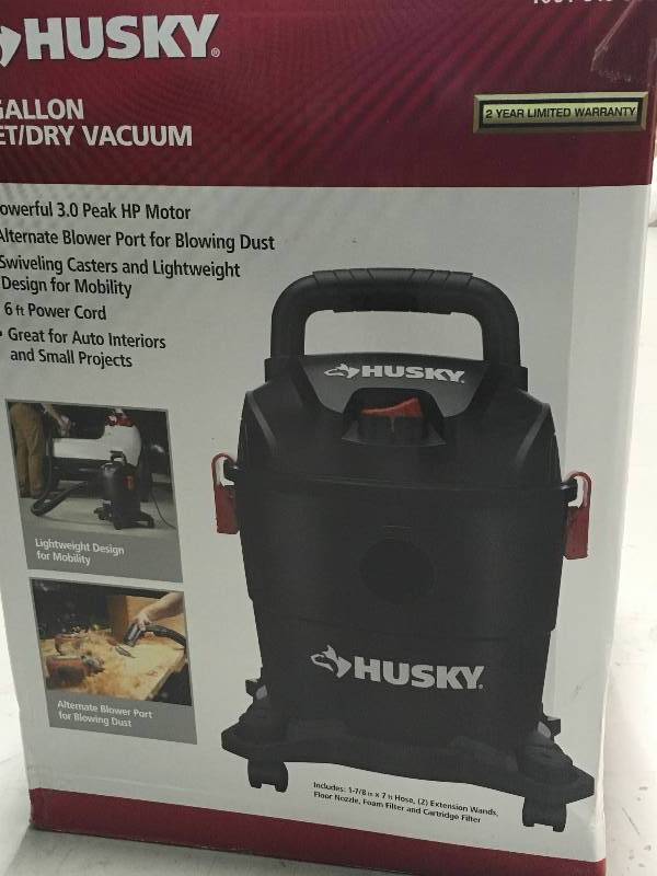lot 30 image: Husky 4 Gal. Portable Poly WetDry Vac not used