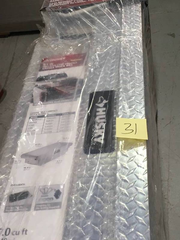 lot 31 image: Husky 61.8 in. x 20.5 in. x 15.7 in. Aluminum Compact Low Profile Saddle Truck Box