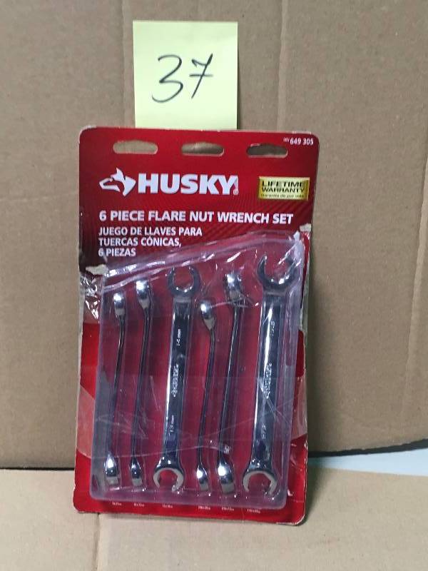 lot 37 image: Husky SAE & MM Flare Nut Wrench Set (6-Piece) not used