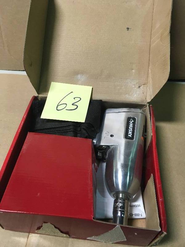 lot 63 image: Husky 12 in. 300 ft. lbs. Impact Wrench USED in good working condition