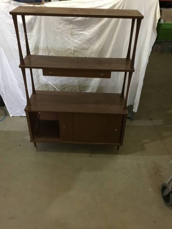 lot 25 image: Vintage Book Shelf  Drawer spins on top, and has access to the bottom area from both sides antique
