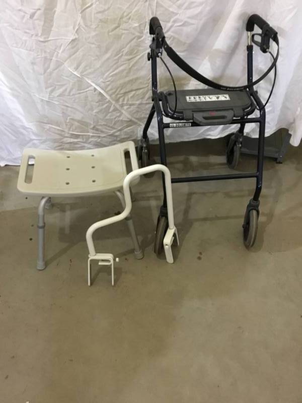lot 26 image: Medical Equipment  Walker with seat and Breaks, Shower Chair and bath tub Rail