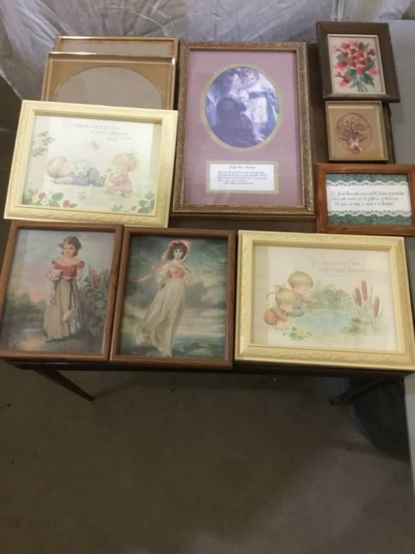 lot 51 image: 10 Picture Frames  2 blanks and 8 with pictures inside of them