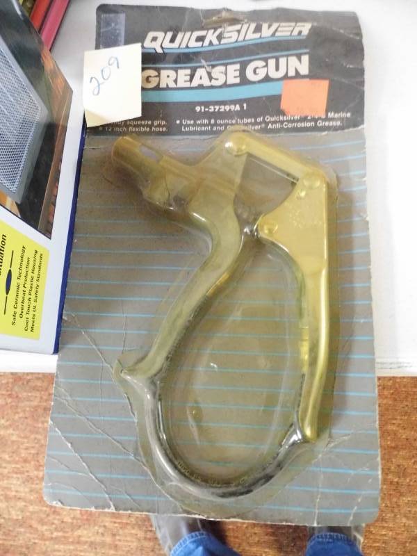 lot 209 image: Quicksilver Grease Guns