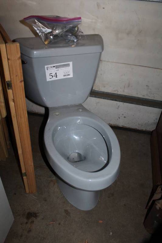 lot 54 image: Kohler Elongated Toilet - Limited Edition Kohler Grey, Bathroom Faucet