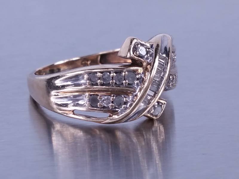 Many Diamonds set in Yellow Gold
