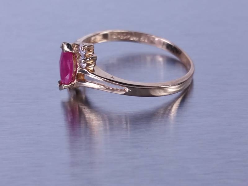 Ruby and Diamond Ring set in 10K Yellow Gold