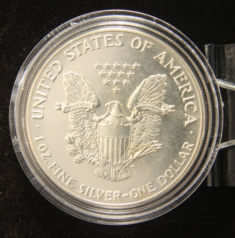1987 AMERICAN SILVER EAGLE 1 TROY OZ. .999 FINE SILVER IN AIRTITE
