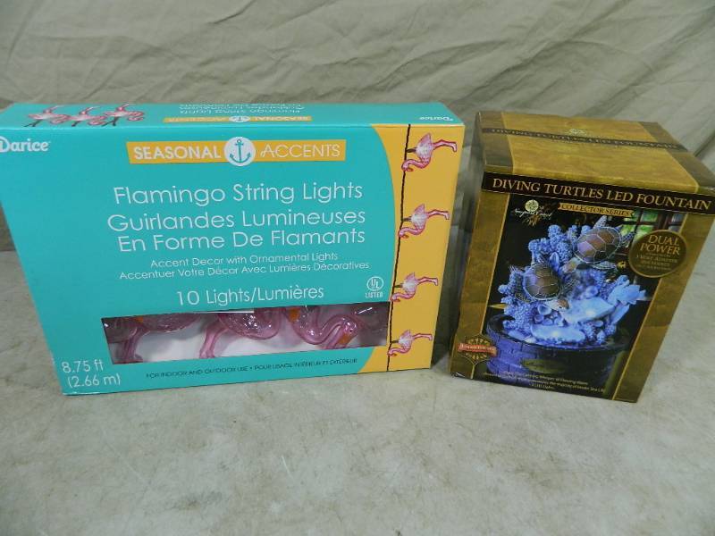 lot 23 image: New Diving Turtles Fountain and New Flamingo String Lights