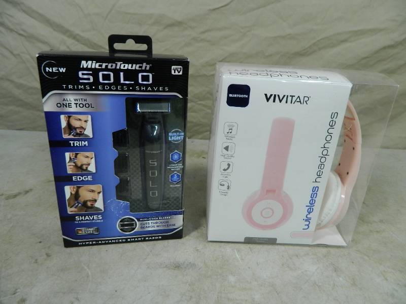 lot 25 image: New Mens Shaver and New Wireless Headphones