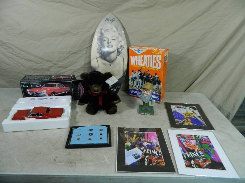 lot 26 image: Nasa Pins, Mink Teddy Bear, and More