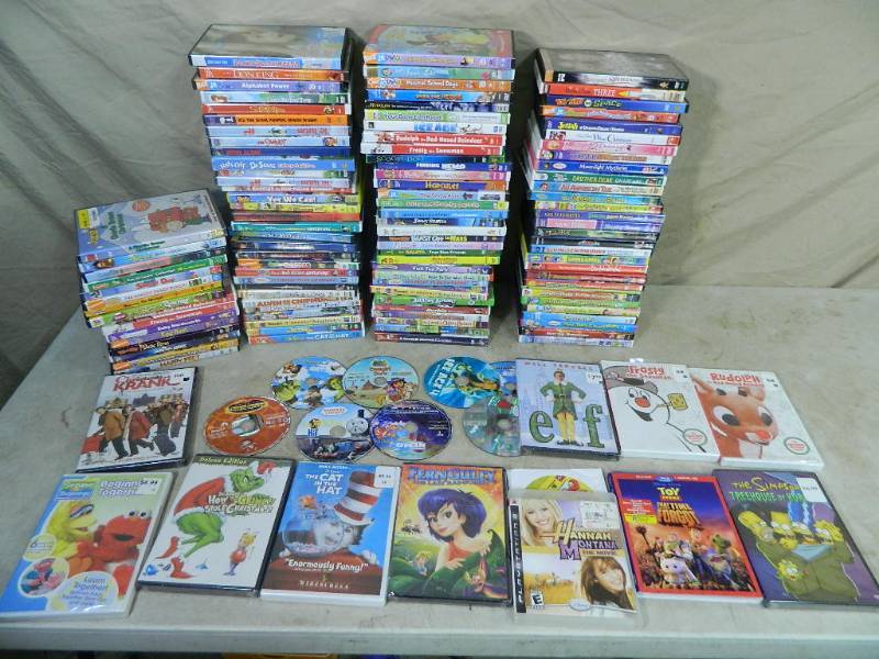lot 93 image: Over 125 Kids DVDs, Blu Ray, and Games