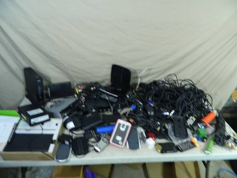 lot 96 image: Assorted Electronics, Modems, Cords, Comcast, Etc