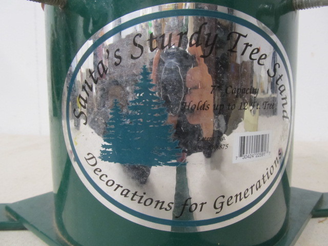 lot 118 image: Solid Iron SANTAS STURDY TREE STAND Christmas Tree Stand