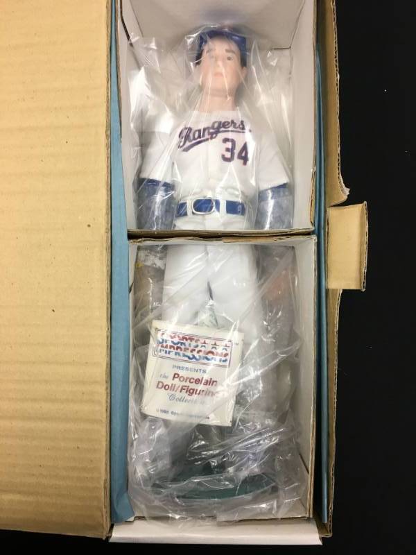 lot 73 image: Sports Impressions  Nolan Ryan  Porcelain Doll - 15