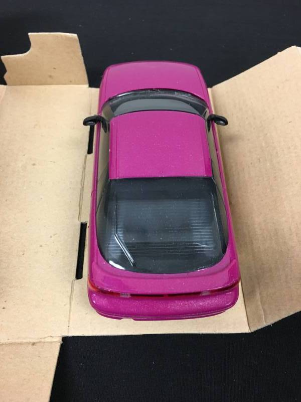 lot 131 image: ERTL 1993 Chevrolet Geo Storm (Plastic Promo) 125 Scale