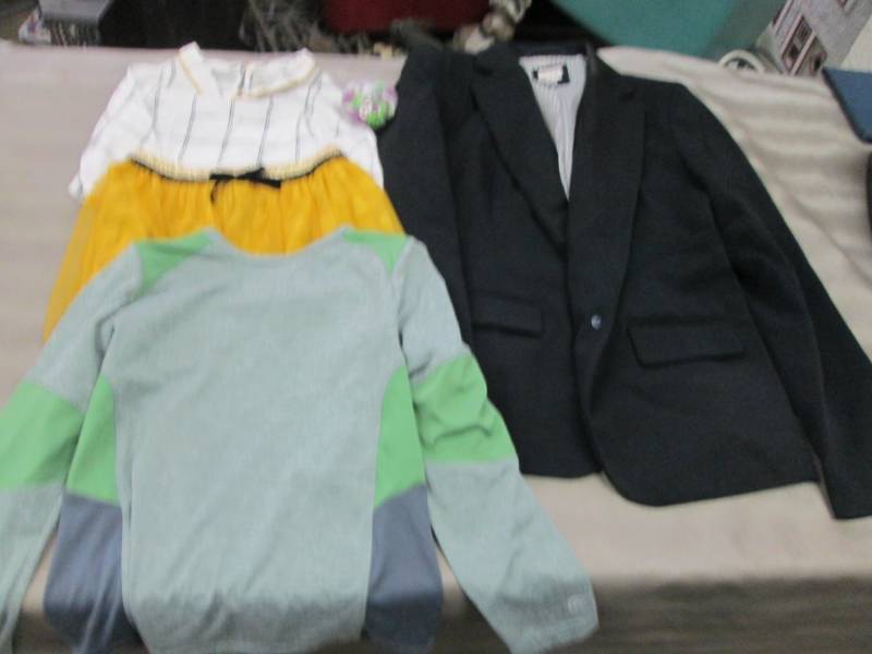 lot 11 image: Size 6 Black Jacket, 12 month Shirt...