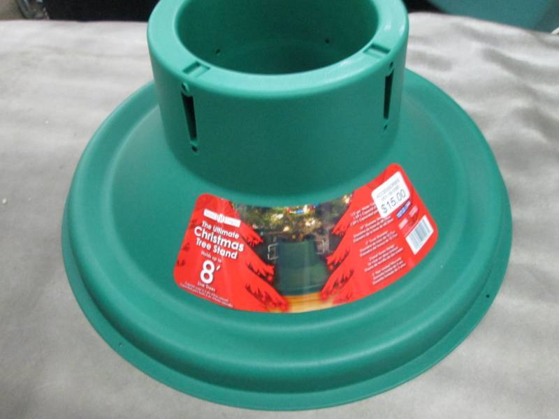 lot 19 image: Ultimate Christmas Tree Stand Retai...