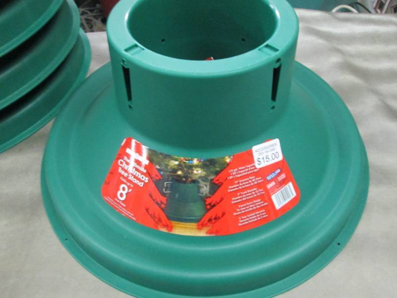 lot 24 image: Ultimate Christmas Tree Stand Retai...