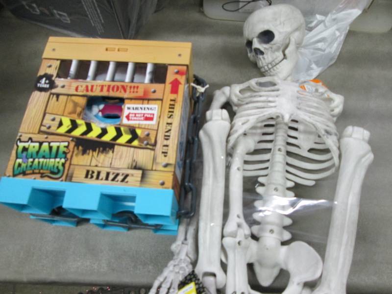 lot 186 image: Crate Creature, Skeleton...
