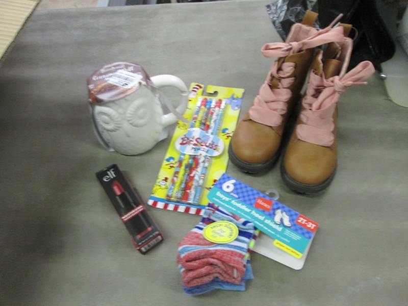 lot 196 image: White Mug, Pencils, Size 8 Boots Re...