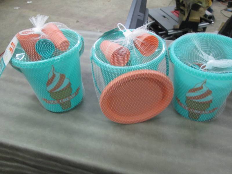 lot 215 image: Lot of 3 Antsy Pants Sand Toys...
