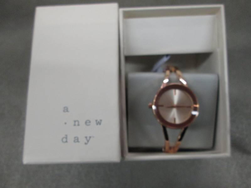 lot 233 image: A New Day Rose Gold Tone Watch Reta...