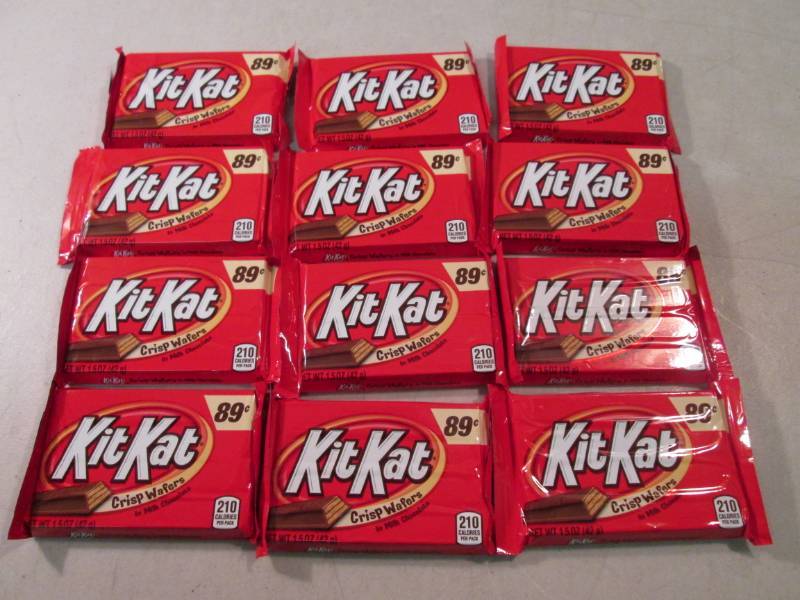 lot 217 image: 12 Kit Kat Candy Bars Best by Jan 2...