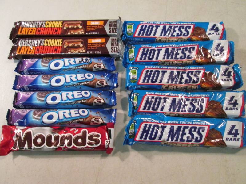 lot 228 image: 12 Misc Candy Bars Best by dates va...