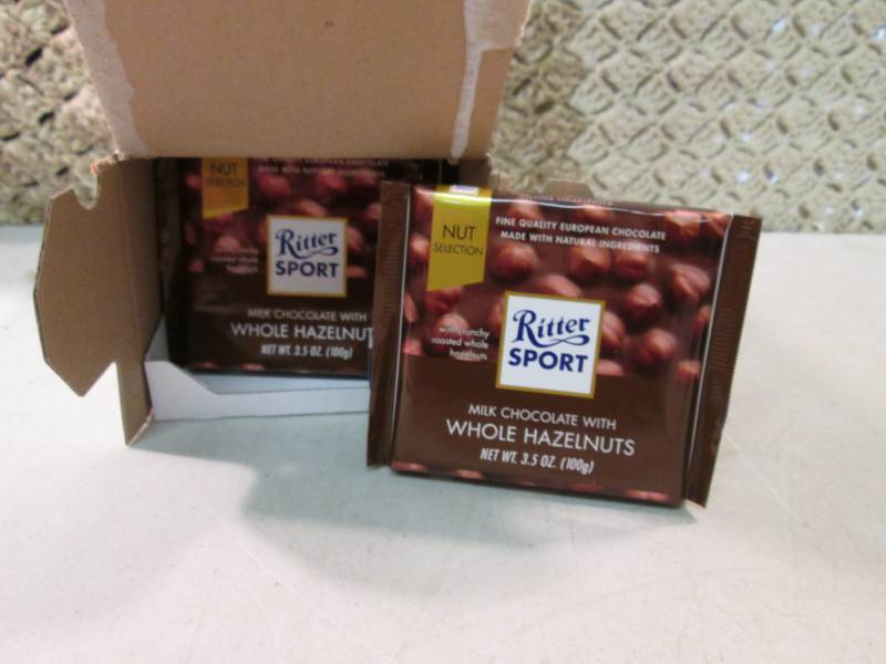 lot 254 image: Box of 10 Ritter Sport Milk Chocola...