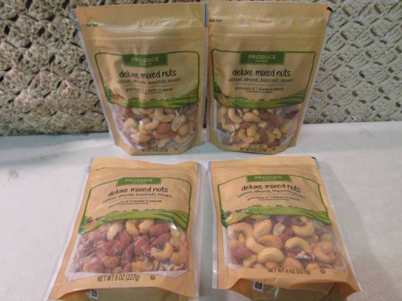 lot 286 image: 4 Bags of Deluxe Mixed Nuts Best by...