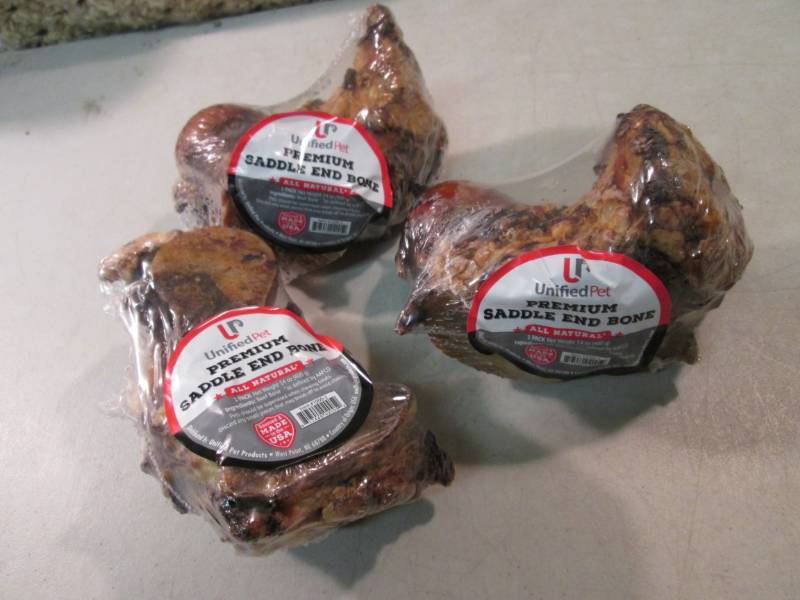 lot 312 image: 3 Premium Saddle End Bone Dog Chews...