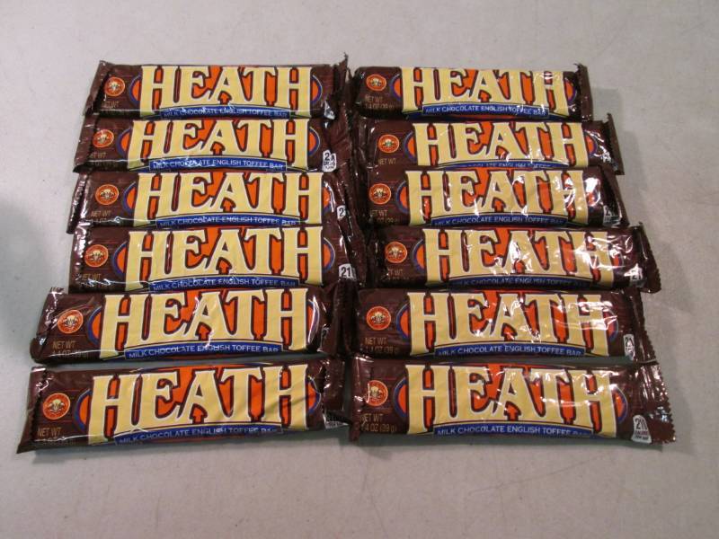 lot 317 image: 12 Heath Candy Bars Best by Jan 201...