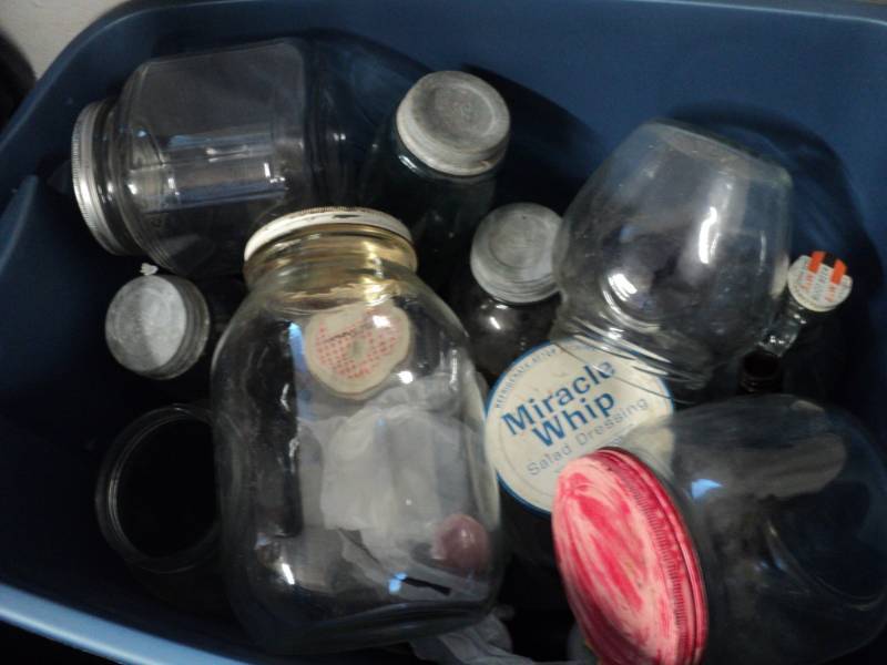 covered tote filled with jars and l...