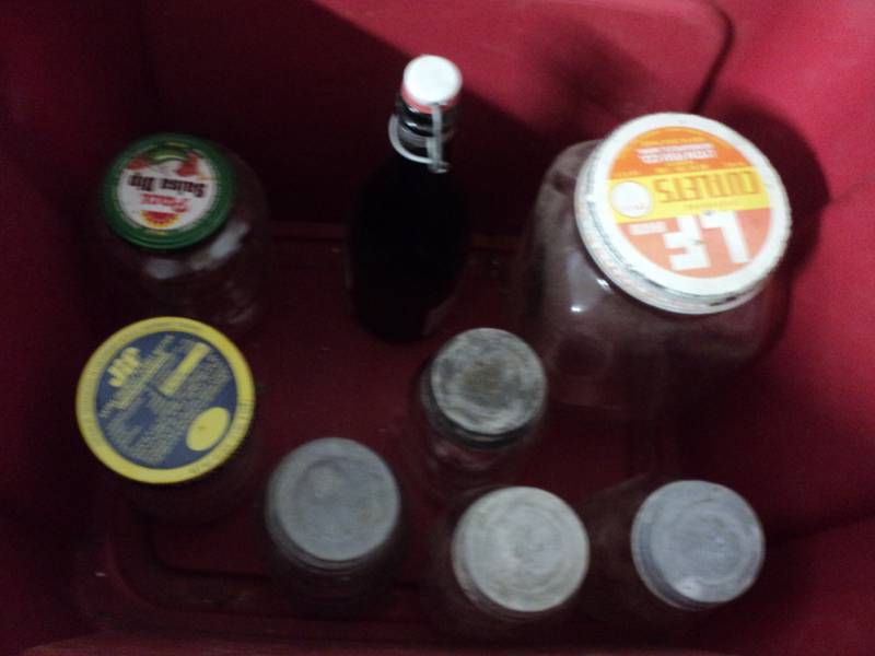 covered tote filled with jars and l...