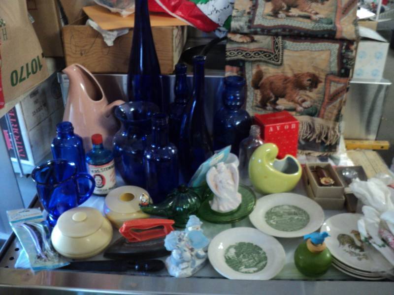 covered tote full of collectibles...