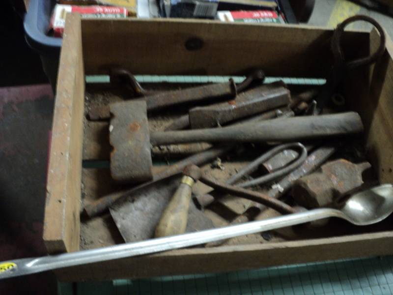 Cast Iron vintage tools in a wood b...