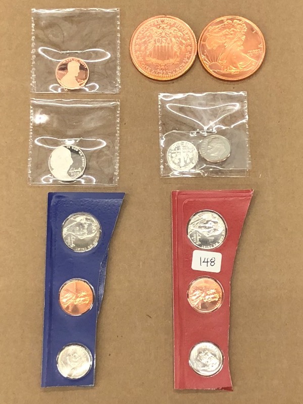 (2) 2015 UNC Coin Sets, (2) 1oz Copper Medals, (4) Loose UNC Coins