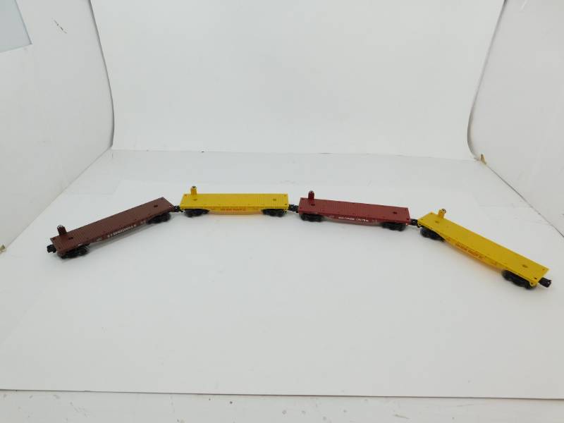 lot 3 image: Four Flatbed (O Scale) Train Cars